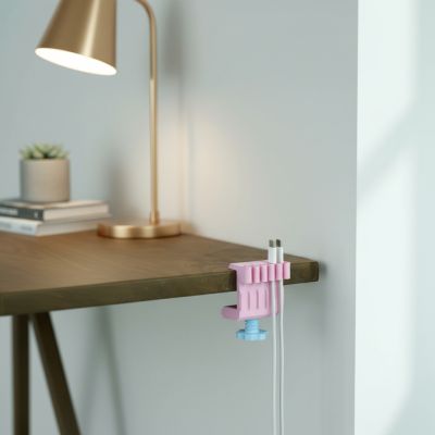 Fixation câble bord de table - plastique - Rose